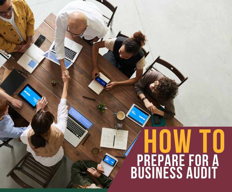 Team preparing a business audit report