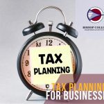 Alarm clock with a post-in note reading Tax Planning