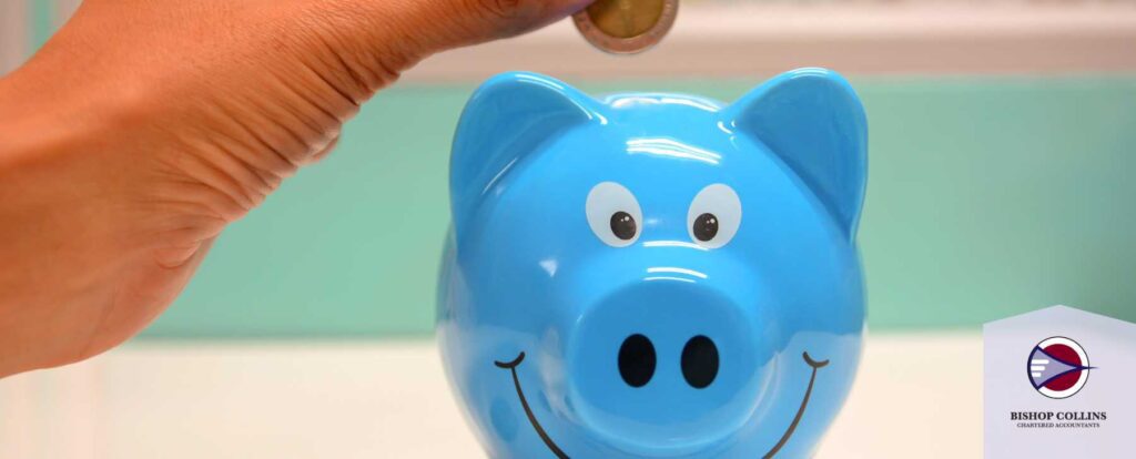 Adding a coin to the piggy bank